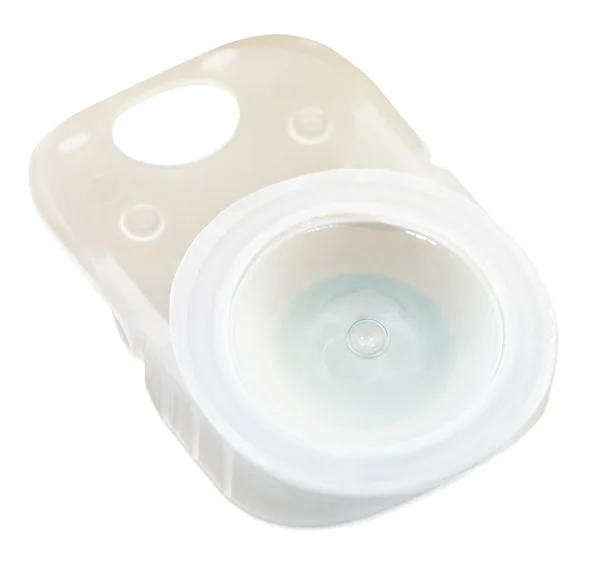 Plastic container with solution and contact lens — Stock Photo, Image