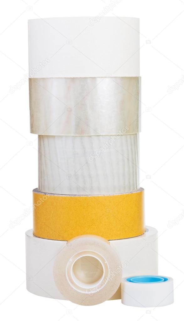 various adhesive tape rolls isolated on white