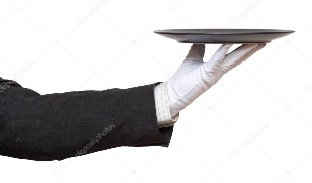 hand in white glove with black plate