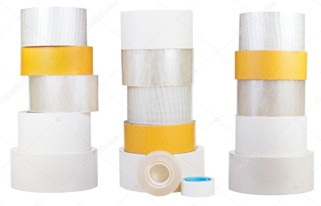 set of stacks of adhesive tape rolls isolated on white