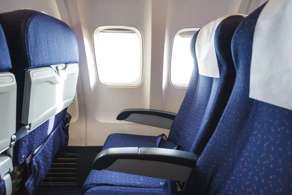 Seats in economy class section of aircraft — Stock Photo, Image