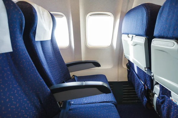 Textile seats in economy class section of airplane — Stock Photo, Image