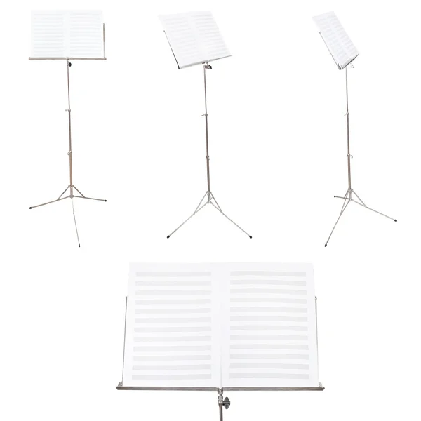 Conjunto de soportes musicales con libro de música en blanco aislado —  Fotos de Stock