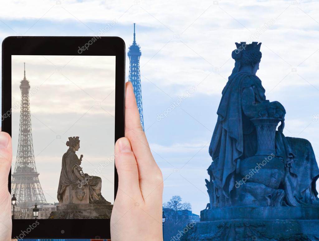 tourist taking photo of statue Marseille, Paris