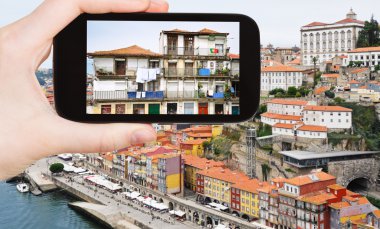 tourist taking photo of Porto city clipart