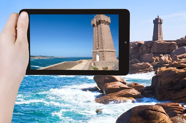 Tourist taking photo of Lighthouse in Bretagne — Stock Photo, Image