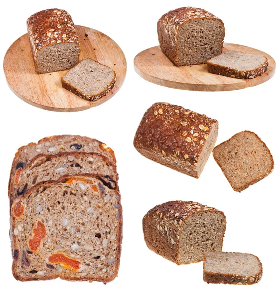 Chleb pełnoziarnisty plasterki na białym tle — Zdjęcie stockowe
