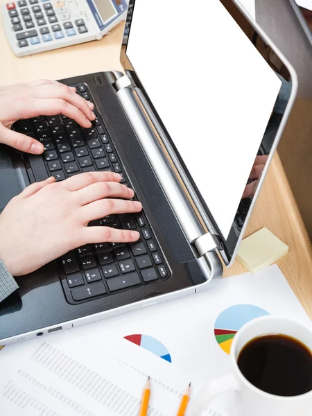 Office worker working on laptop with cutout screen — Stock Photo, Image