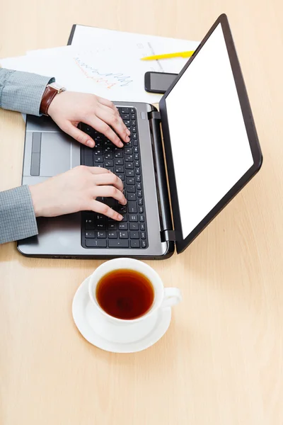 Working with laptop with cut out screen at desk — Stock Photo, Image