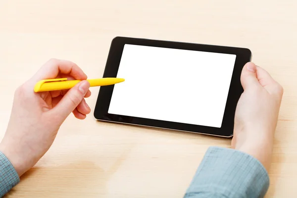 Man touches by pen of tablet PC with cutout screen — Stock Photo, Image