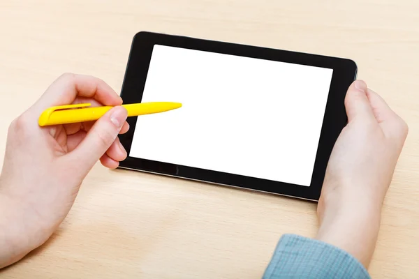 Man touches by pen of cutout screen tablet PC — Stock Photo, Image