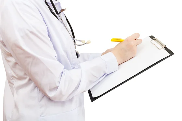 Physician writes in clipboard isolated on white — Stock Photo, Image