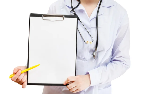 Nurse points on clipboard with blank paper — Stock Photo, Image