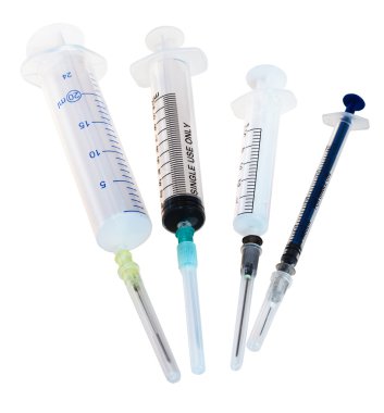 four new empty medical plastic disposable syringes clipart
