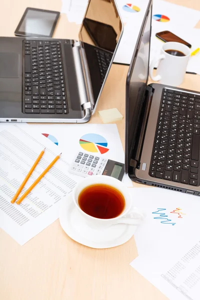 Desk with tools in modern office — Stock Photo, Image