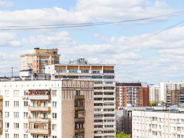 urban many-storied houses in spring day