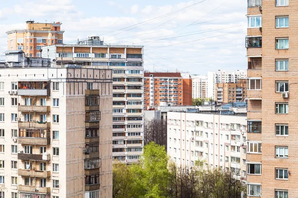 City many-storied houses in spring day — Stock Photo, Image