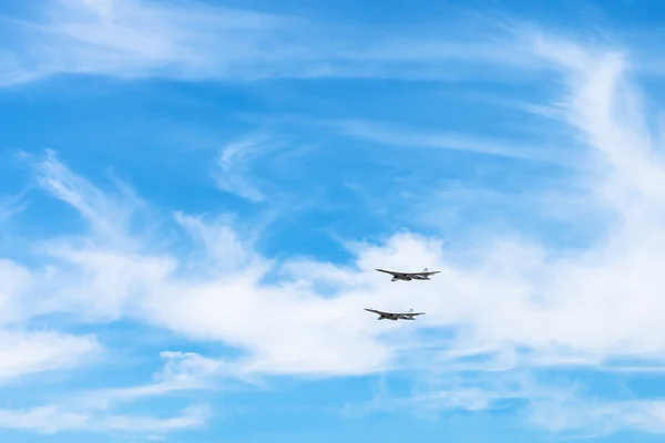 Two strategic bomber aircrafts in white clouds — Stock Photo, Image