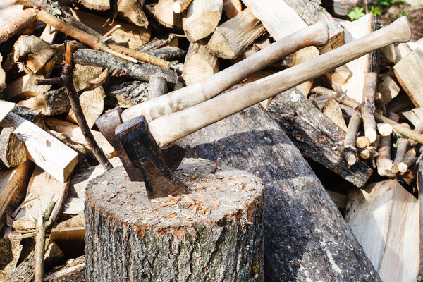 ax and cleaver on rustic courtyard