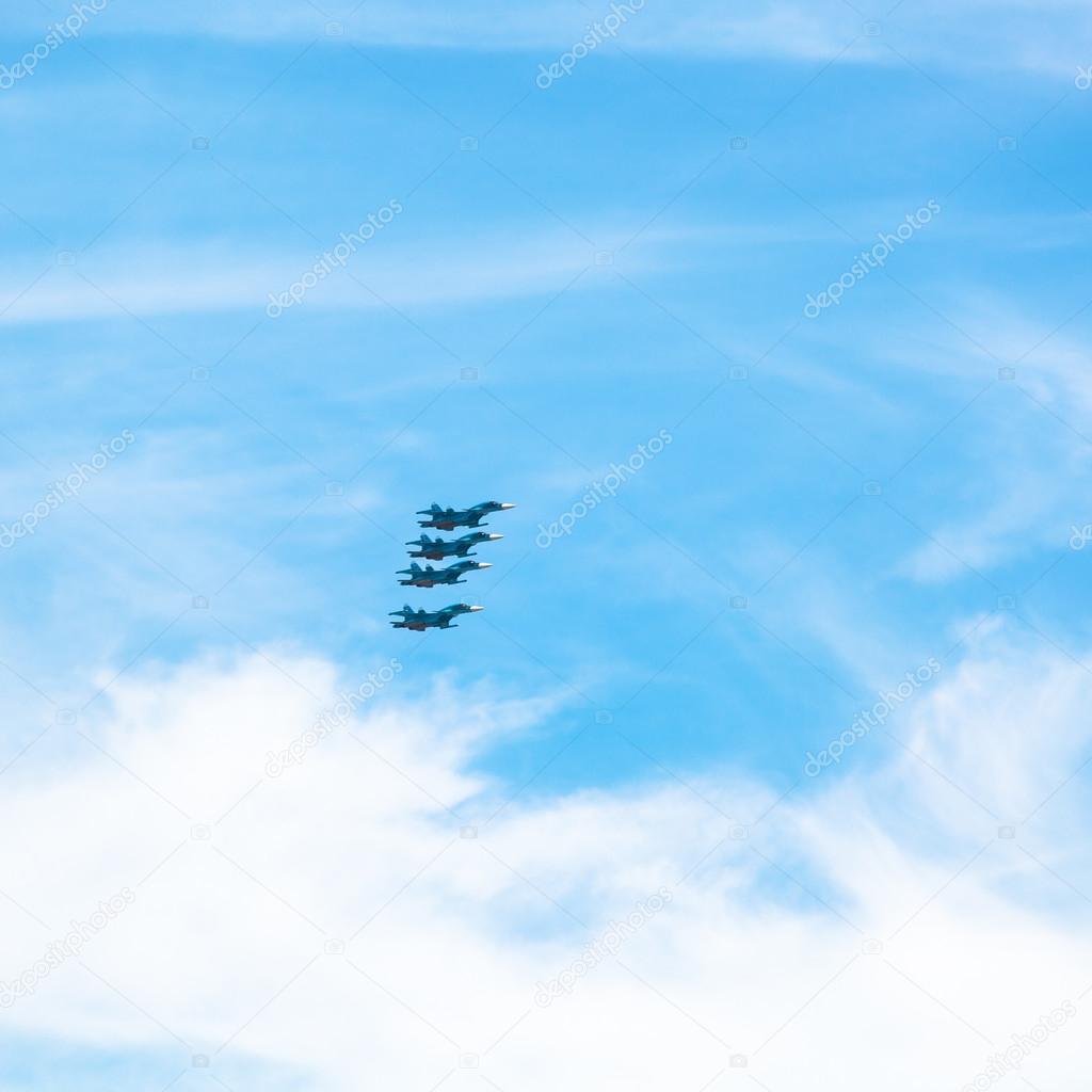 green military fighter aircrafts in cloudy sky