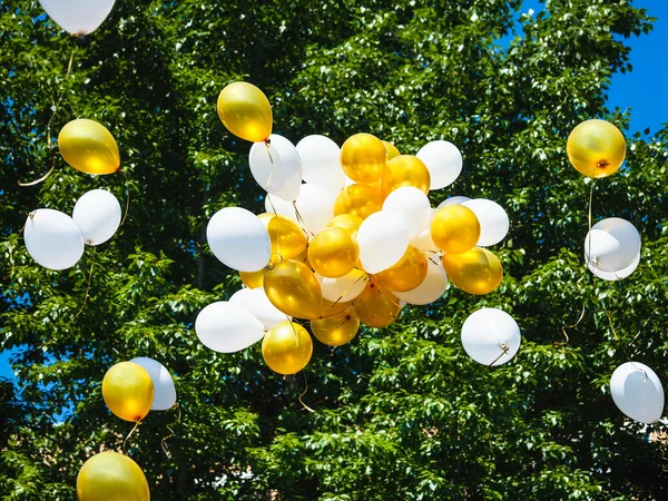 Bunch of balloons floating in air — Stock Photo, Image