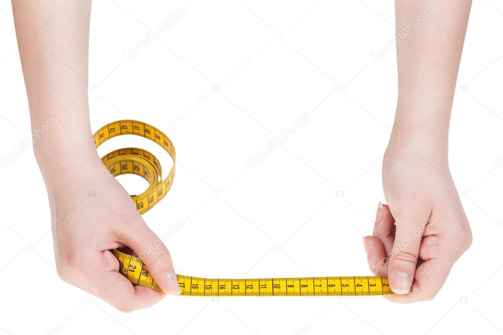 female hands with sartorial measuring tape