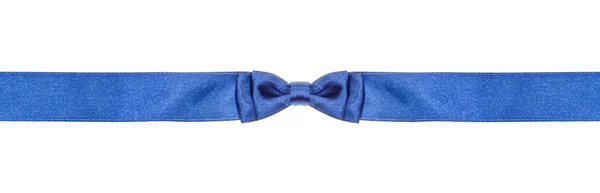 Symmetric blue bow knot on narrow silk ribbon — Stock Photo, Image