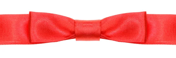 Symmetric red bow knot on wide silk ribbon — Stock Photo, Image
