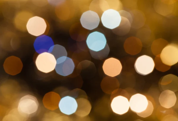 Brown and pink blurred shimmering Christmas lights — Stock Photo, Image