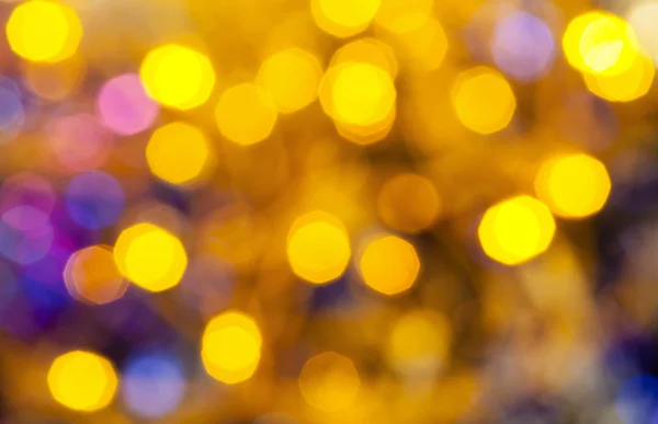 Amarillo azul borroso brillantes luces de Navidad — Foto de Stock