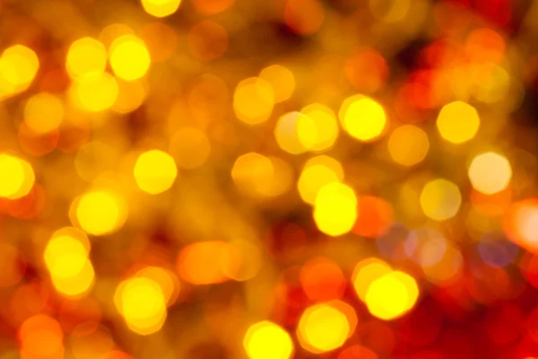 Luz de Navidad parpadeante amarillo oscuro y rojo — Foto de Stock