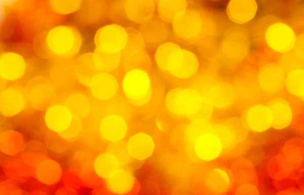 Yellow and red blurred shimmering Xmas lights — Stock Photo, Image