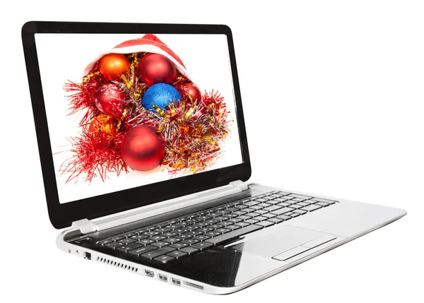 Xmas still life with red and blue balls on laptop — Stock fotografie