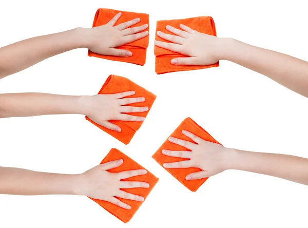 Set of hands with orange microfibre rags isolated — Stock Photo, Image