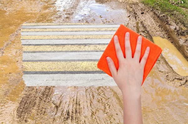 Hand deletes mug on country road by orange cloth — Stok fotoğraf