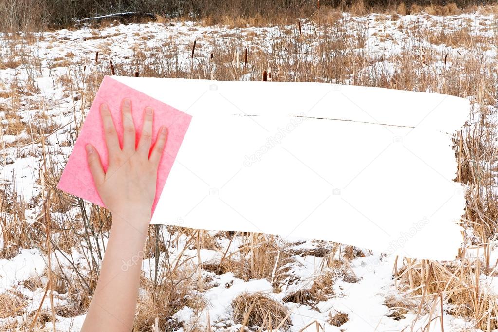 hand deletes frozen swamp by pink rag