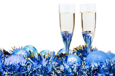two glasses of champagne and blue Xmas baubles