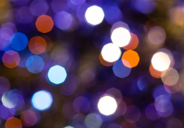 Azul oscuro y violeta parpadeando luces de Navidad — Foto de Stock