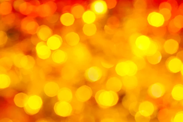 Amarillo y rojo borroso centelleo luces de Navidad — Foto de Stock