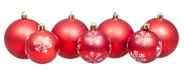 Line of xmas red balls isolated on white — 图库照片