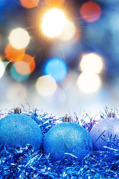 Xmas blue decoration on blurred blue background — Stockfoto