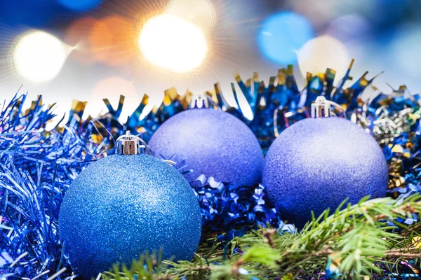 Christmas blue baubles on blurred blue background — 图库照片