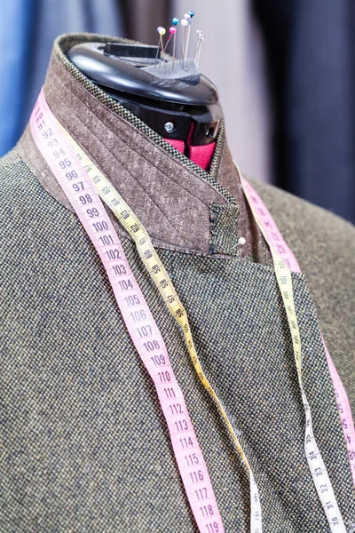 woolen tweed jacket on dummy and ready suits