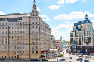 Balchug street and Raushskaya embankment in Moscow clipart