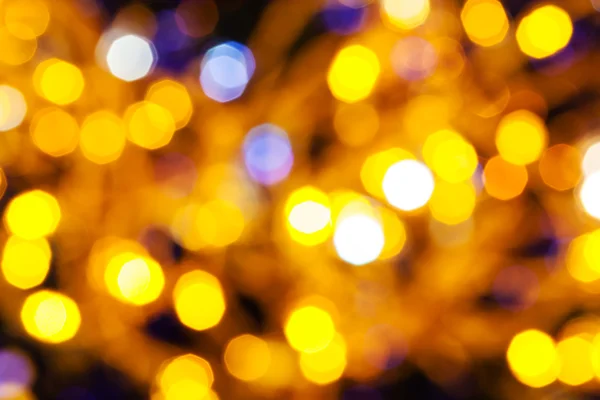 Lumières de Noël scintillantes jaune foncé et violet — Photo