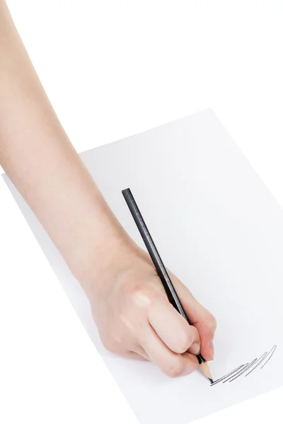 Mão desenha a lápis preto na folha de papel — Fotografia de Stock