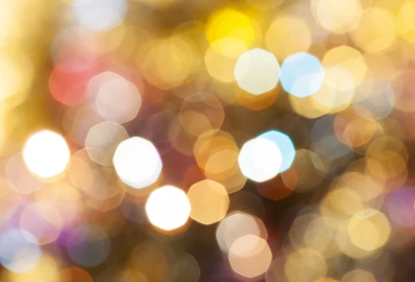 Light brown blurred shimmering Christmas lights — Stock Photo, Image