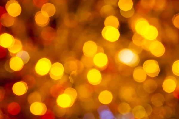 Lumières de Noël floues brun foncé jaune et rouge — Photo