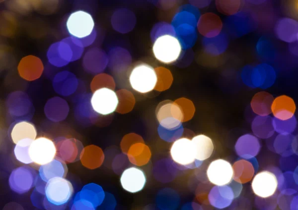 Koyu mavi ve mor Noel ışıkları parıldayan — Stok fotoğraf