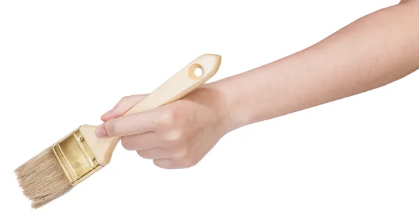 Mão segurando limpo pincel plano isolado — Fotografia de Stock